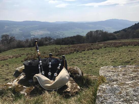 Tay Piping Bagpipes on Scottish Hillside