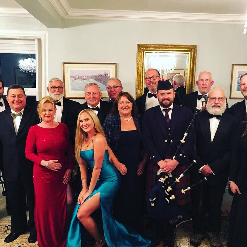 Ross McNaughton of Tay Piping with Black Tie Event guests